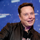 A photo of billionaire Elon Musk smiling at the camera.